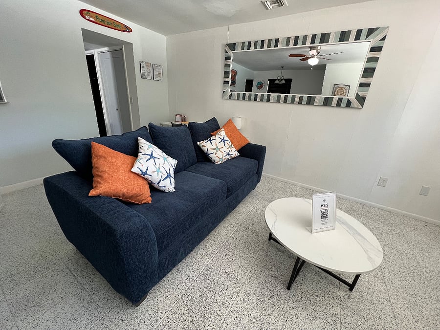 UNIT #2:
New comfortable regular sitting couch added.
Previous sectional pull out bed removed.