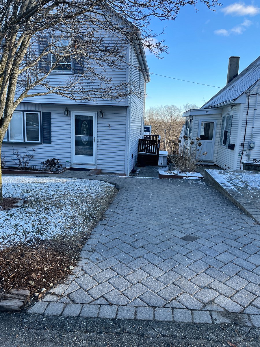 Off street parking spot with access down to unit entry