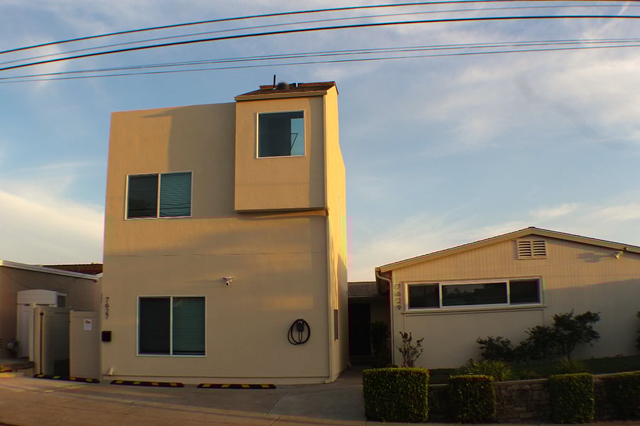 Exterior of the Unit with driveway parking and EV charger