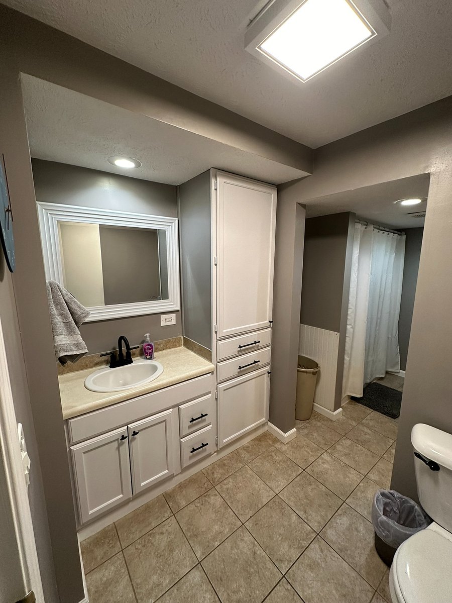 Main-floor bathroom directly across from main-floor bedroom. 