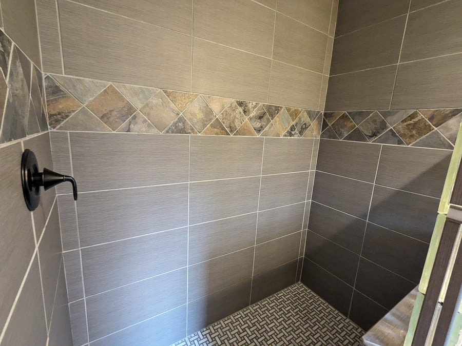 Plenty of daylight in the beautiful, fully tiled custom shower.