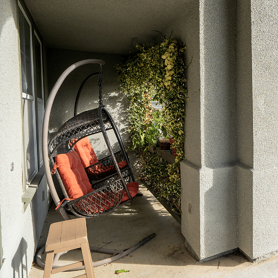 Papasan chairs on the front porch provide a perfect perch to sit and watch the hummingbirds.