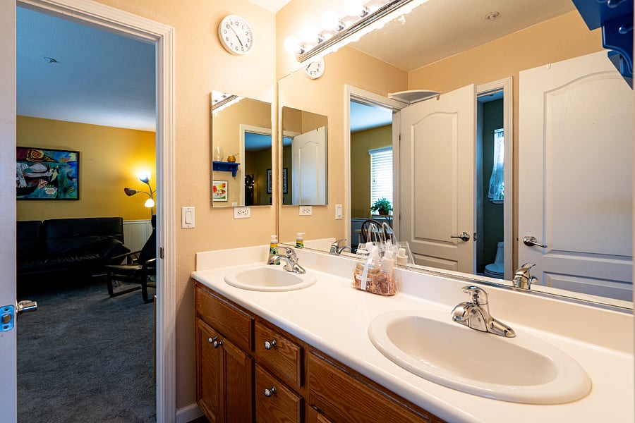 Private bathroom with bathtub and shower. This bathroom connects the two rooms.