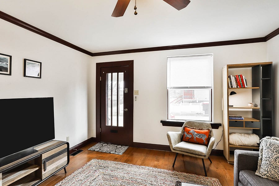 Living room with smartTV, queen sleeper sofa.