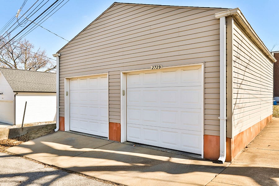 Separate garage adequate for mid-size vehicle with man-door access to yard.