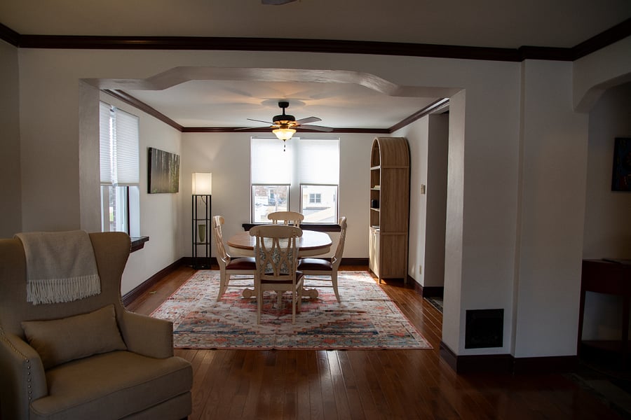 Dining room seats four with extra storage in hutch, serving pieces.