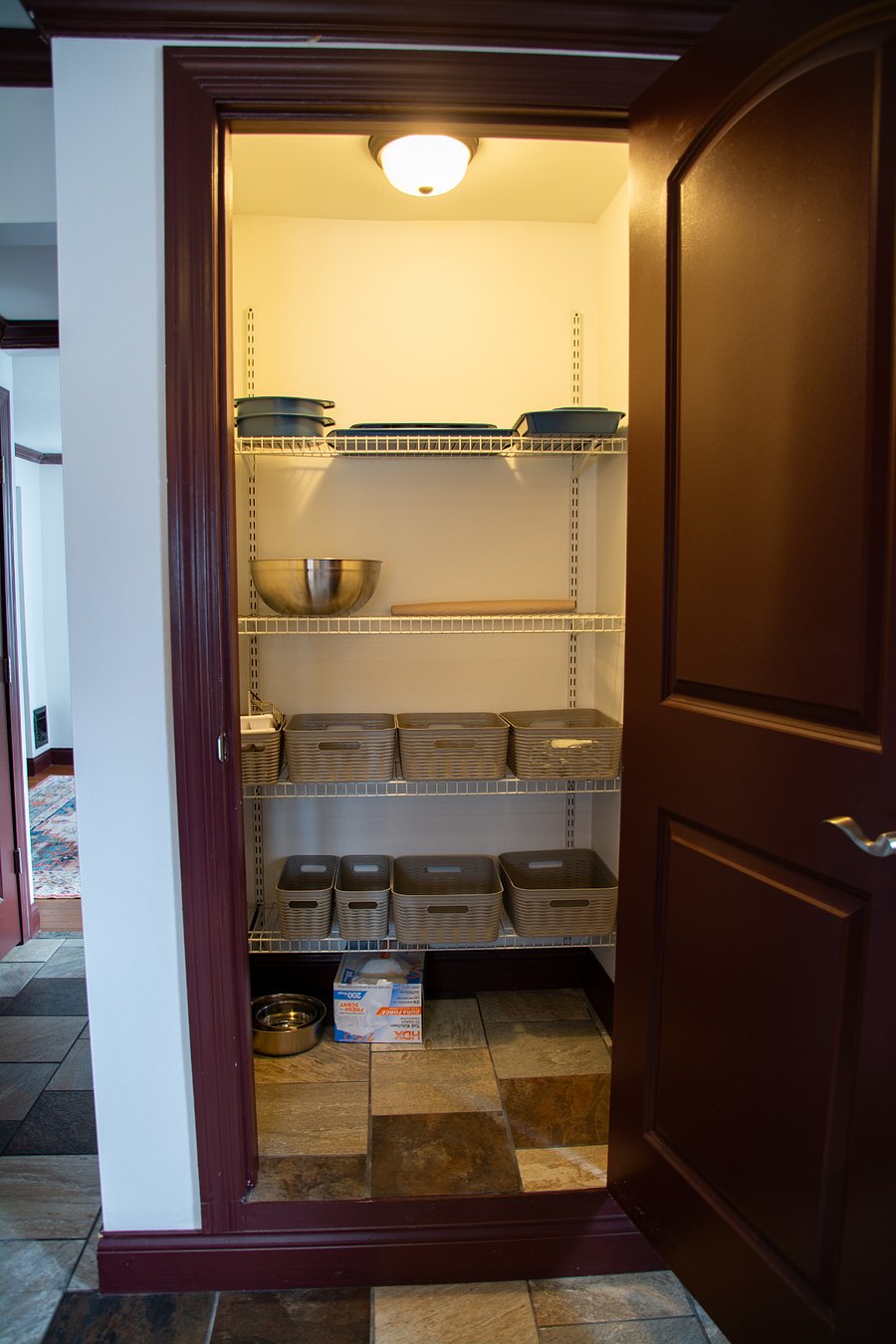 Big pantry with bin storage, baking pans, mixing bowls...and a French rolling pin!