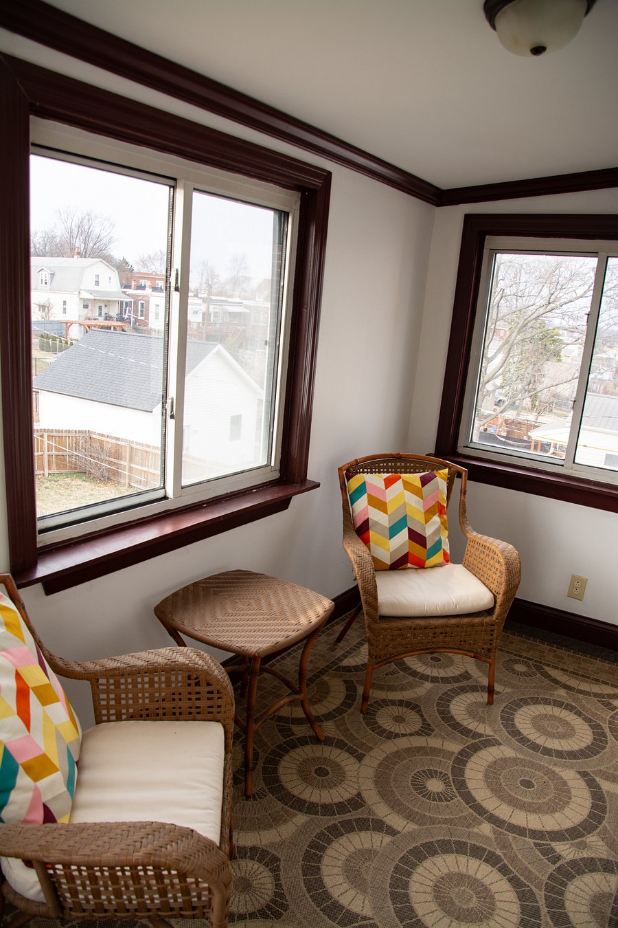 Adorable little sun porch, great for guests to chill in and visit while you are cooking.