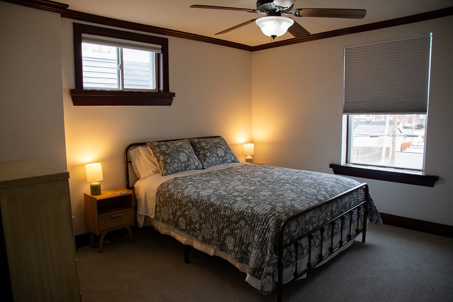 Brand new queen size bed, 4 drawer dress, nightstands and lamps. Black out shades on the windows for those working the night shift. New carpet.