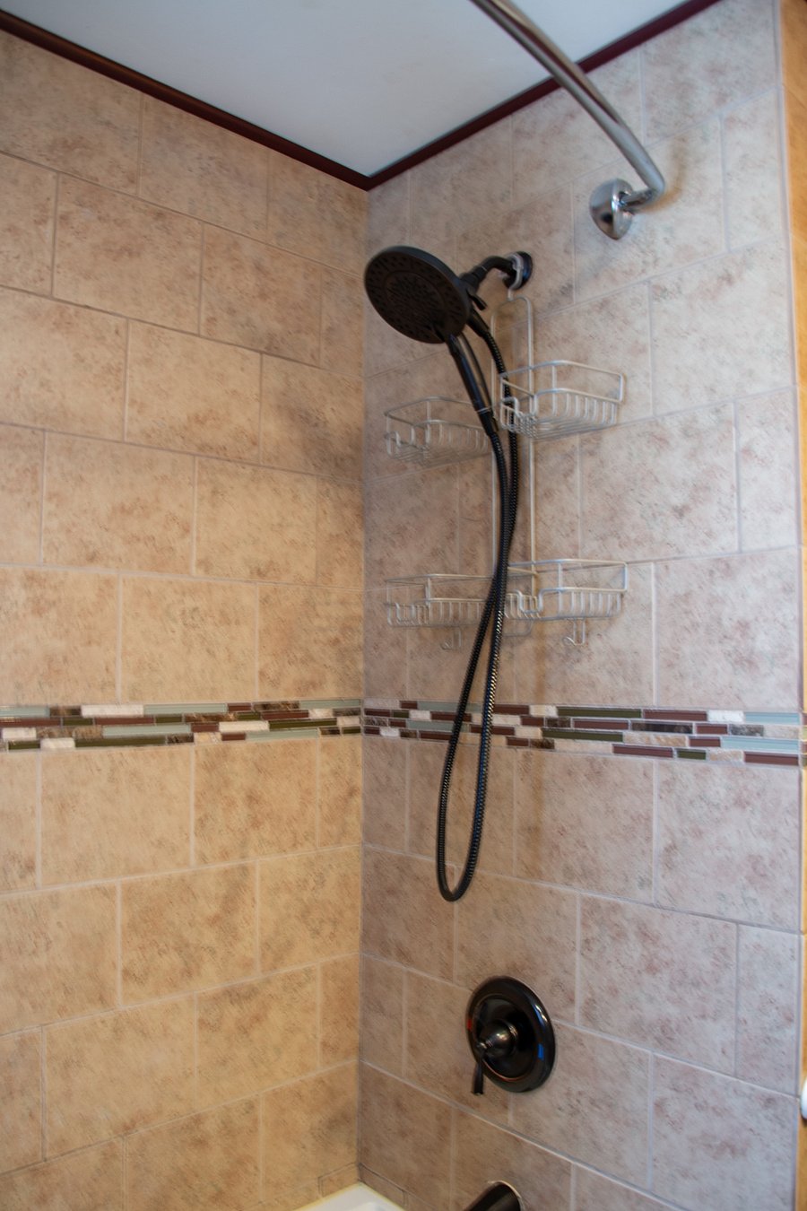 Adjustable hand sprayer shower head.
