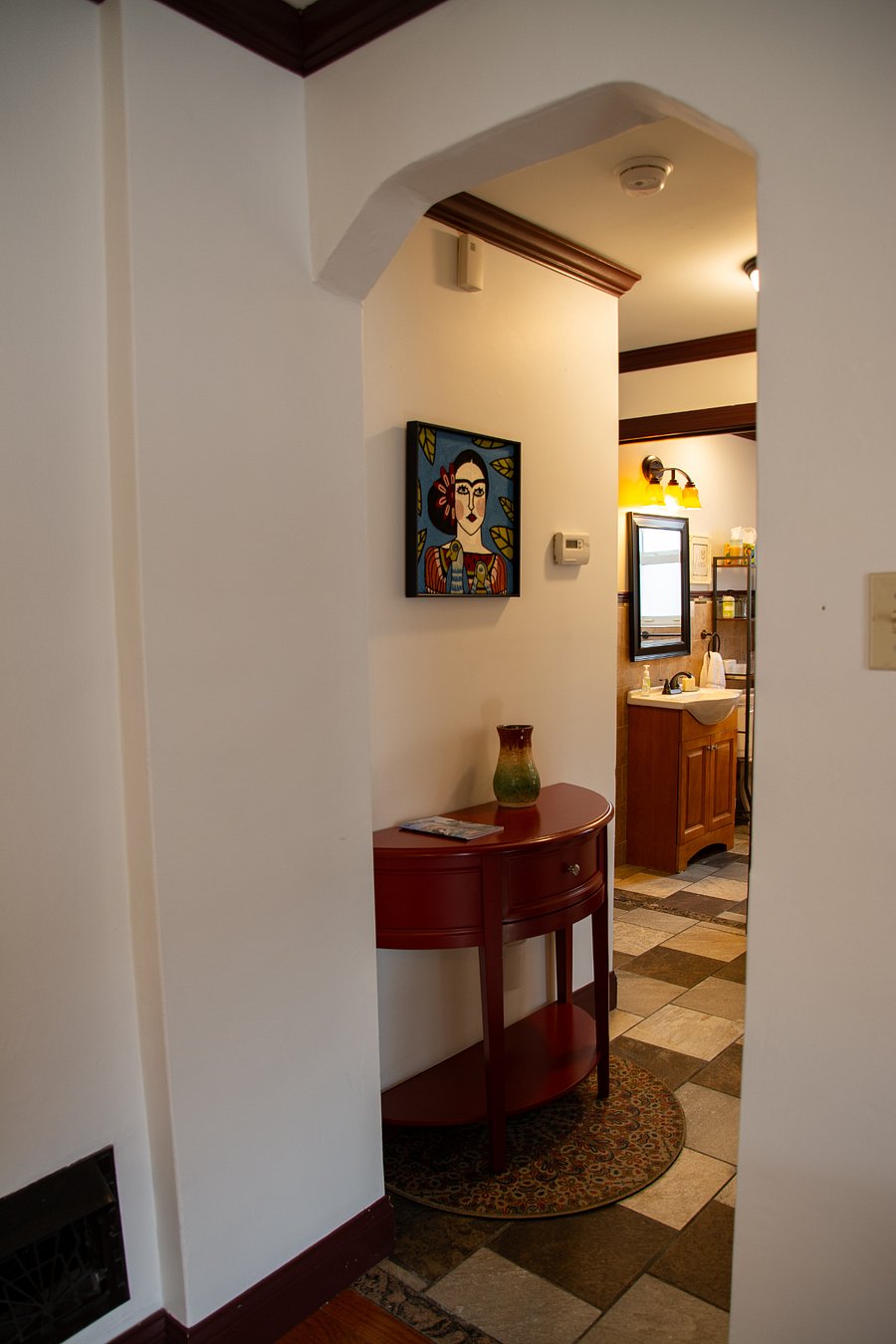 Front entry at top of stairs gives nice place to set down keys, shopping.