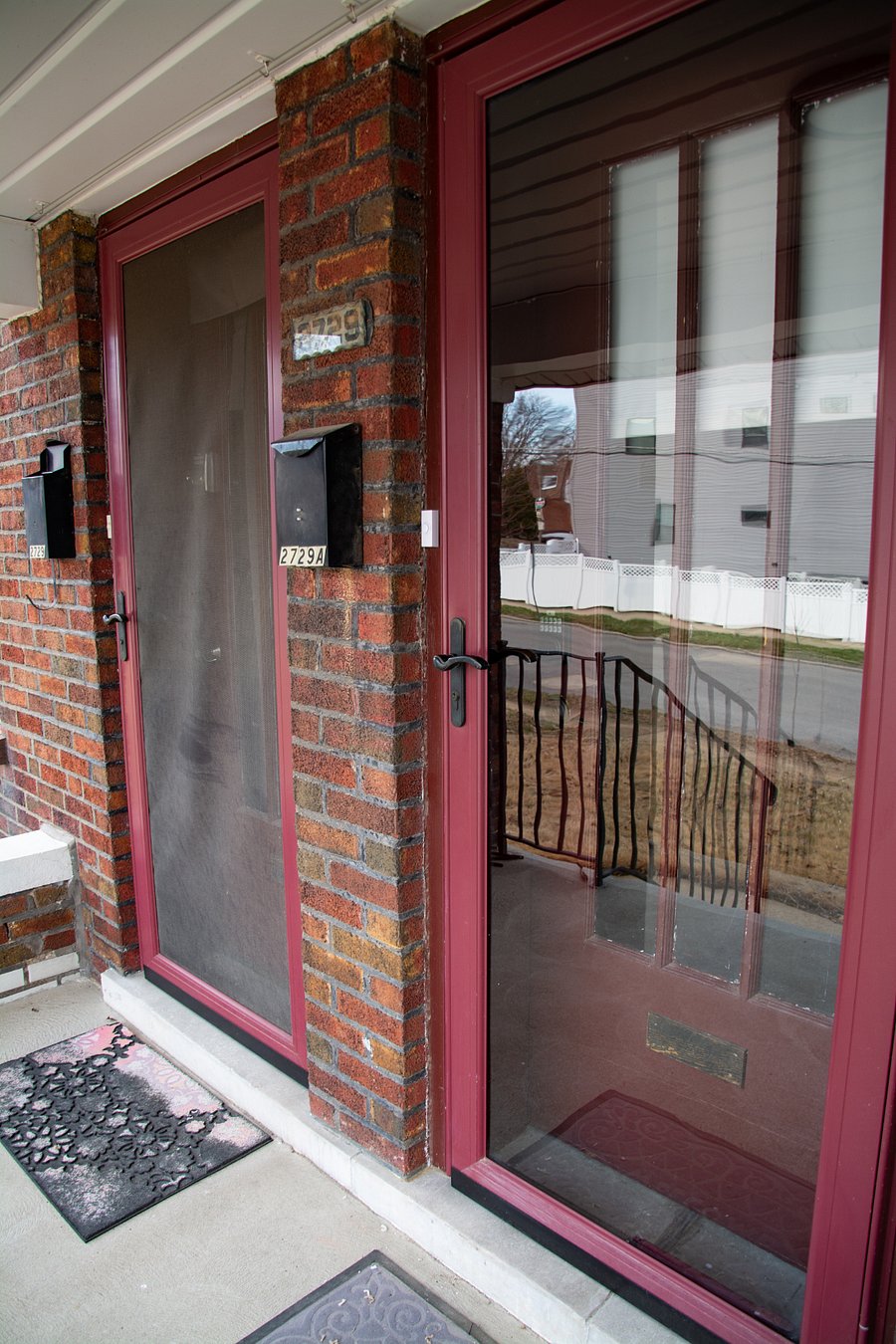 Cute little front porch with touchpad lock.