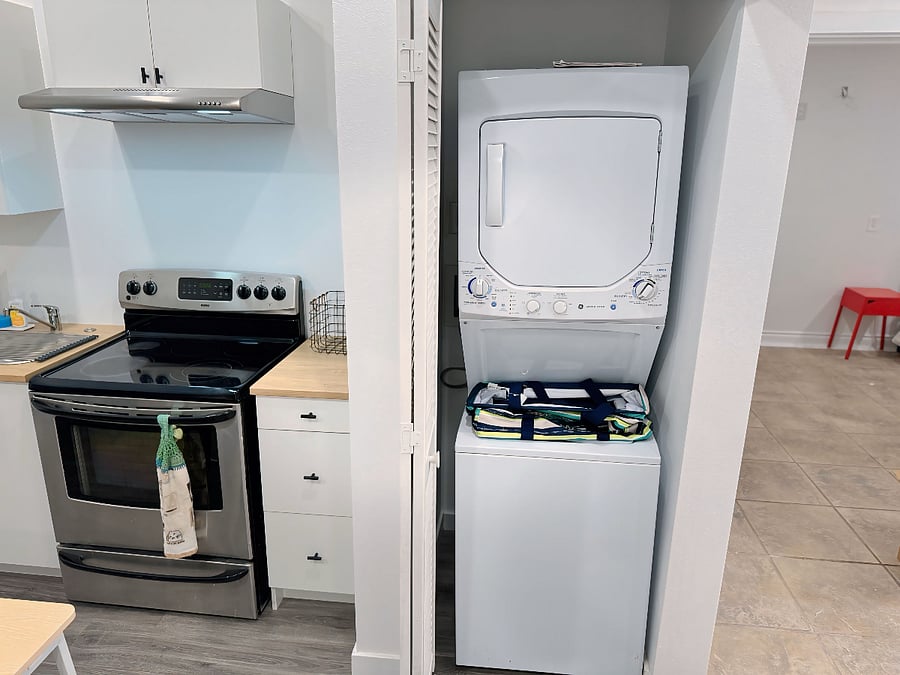 Washer & Dryer in unit for convenience.  Foldable Laundry bag is included