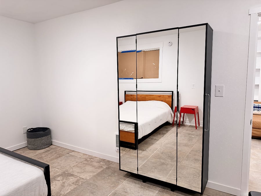Bedroom comes w/ multi-function armoire to store clothing, shoes, linens, ironing board, etc.