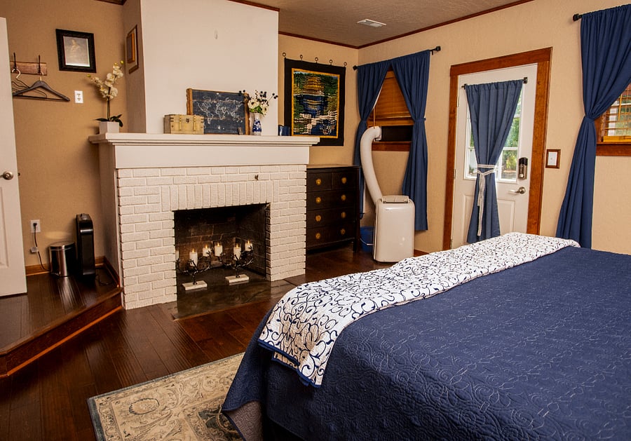 Fireplace Room - Candles in sealed fireplace - King Bed - Linens exchanged biweekly