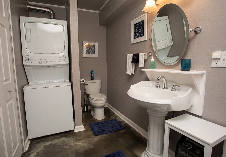 Blue Bath - full size tub/shower with apartment size washer/dryer and space heater.