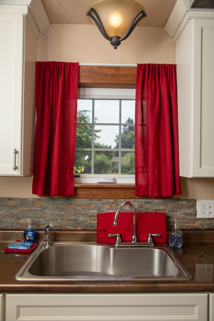 Kitchen - view of the Orchard out the window.