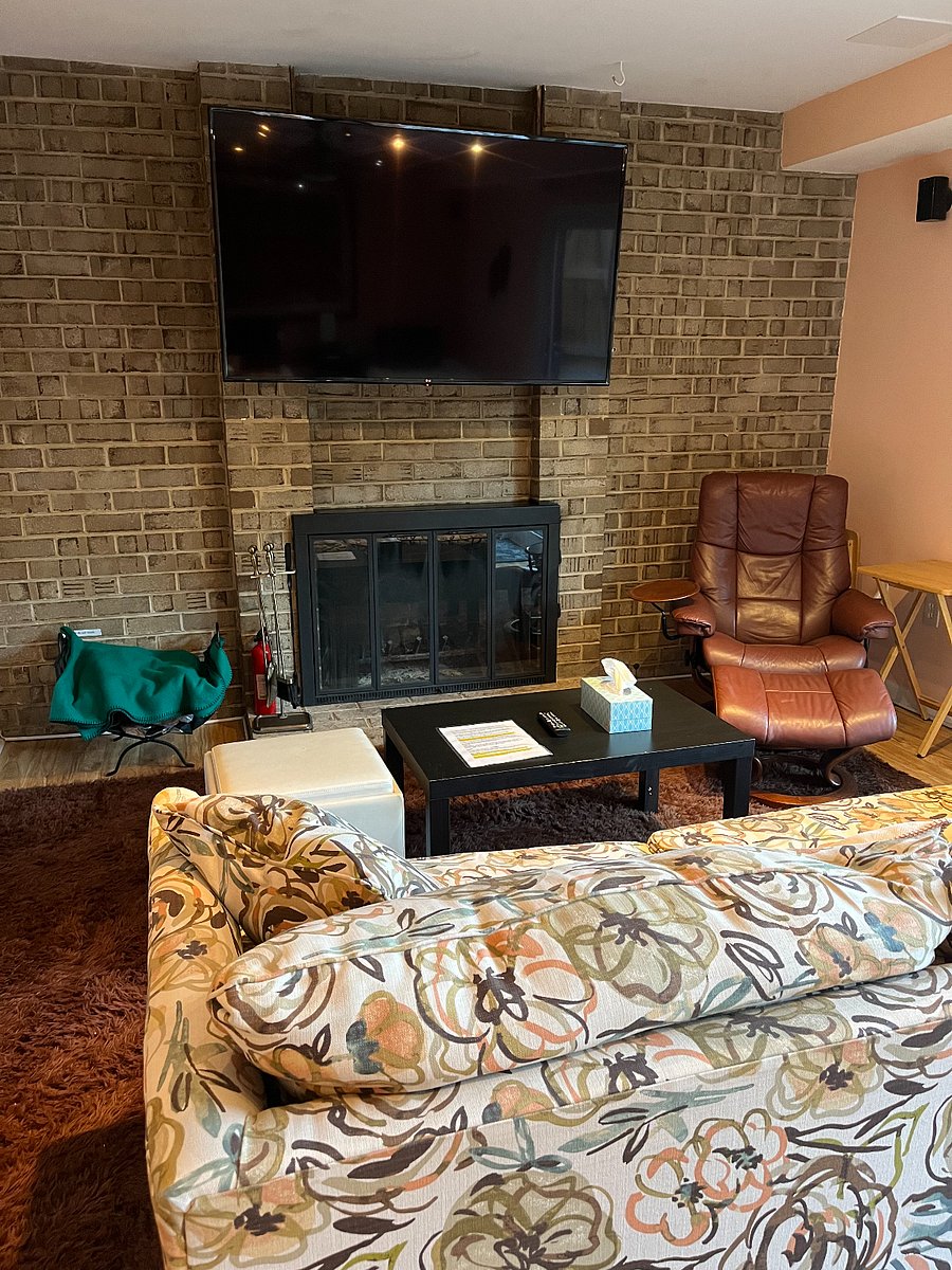 Wood burning fireplace (you provide firewood) and 65 inch Smart TV