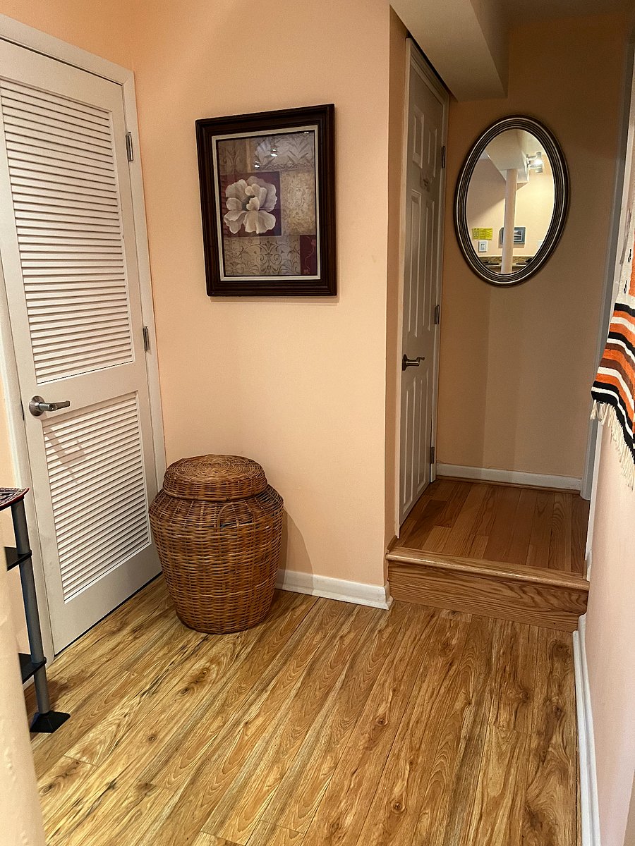One step up to bathroom on right. Basket full of extra blankets. Door on left is locked for owner's Christmas and other personal items! Door on left up the step is the locked stairwell to the owner's home. You are completely private and separated from the owner's home.