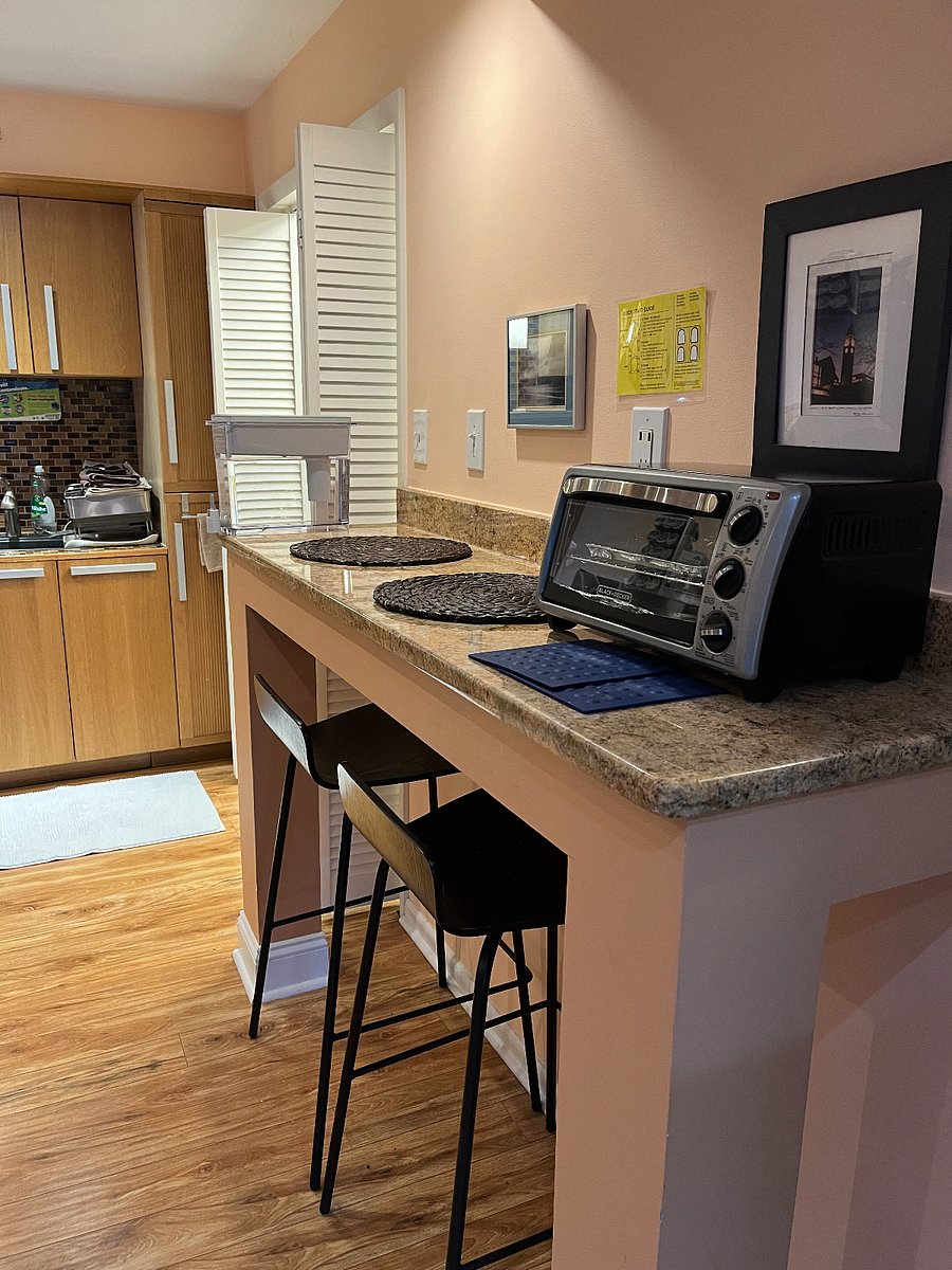Additional granite countertop for work and eating directly across from the other one. USB ports in outlet. Toaster oven.