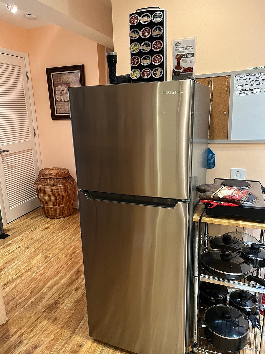 Frost free freezer with ice cube trays. Fridge below.