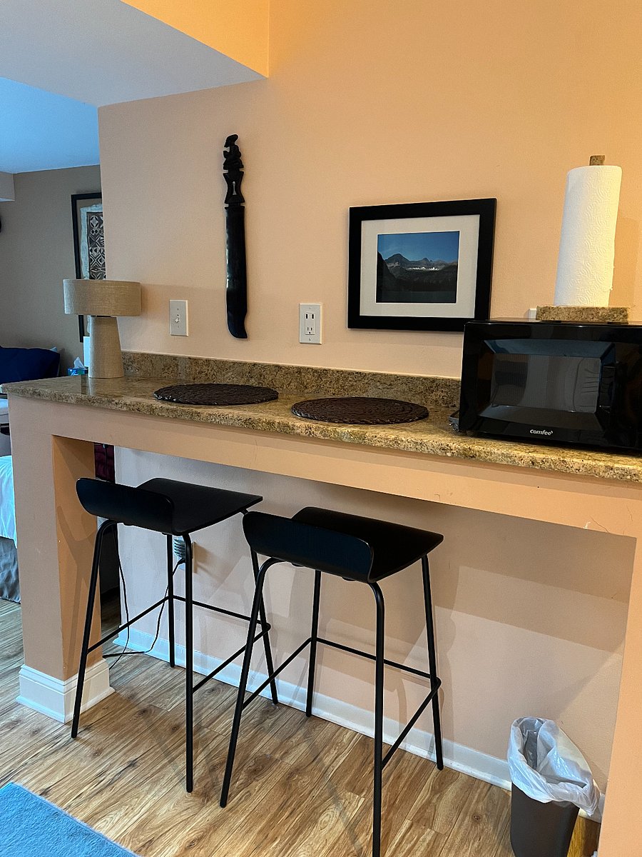 One of the granite long countertops to work and eat. USB port in outlet. Microwave.