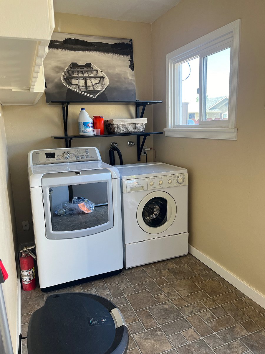 Full laundry room off kitchen.