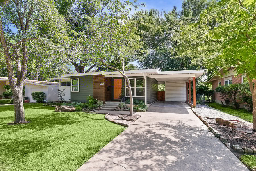 Front-right of home. Freshly renovated and modernized. Large, sweeping canopy of trees. Beautiful landscaping. Covered parking.