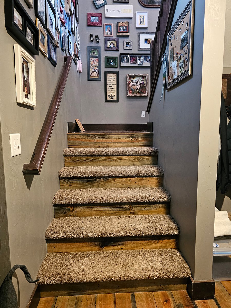 Stairway going upstairs is a split stairway with a landing half way up.