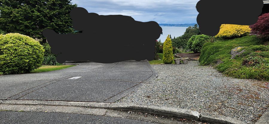 Driveway. Parking for two cars in the right side.
