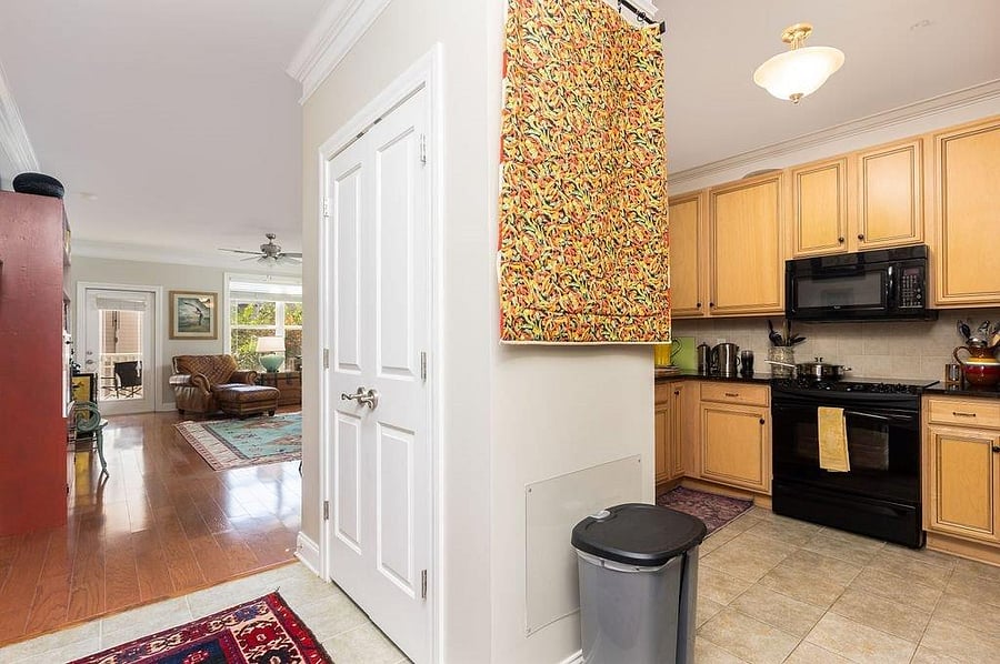 looking into the living room and kitchen from the front door