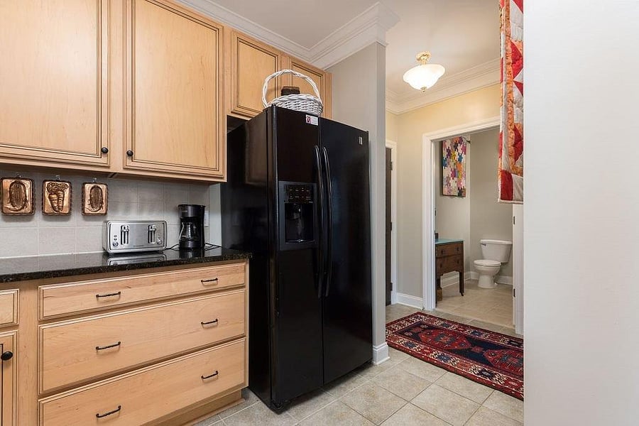 looking into the half bath from the kitchen