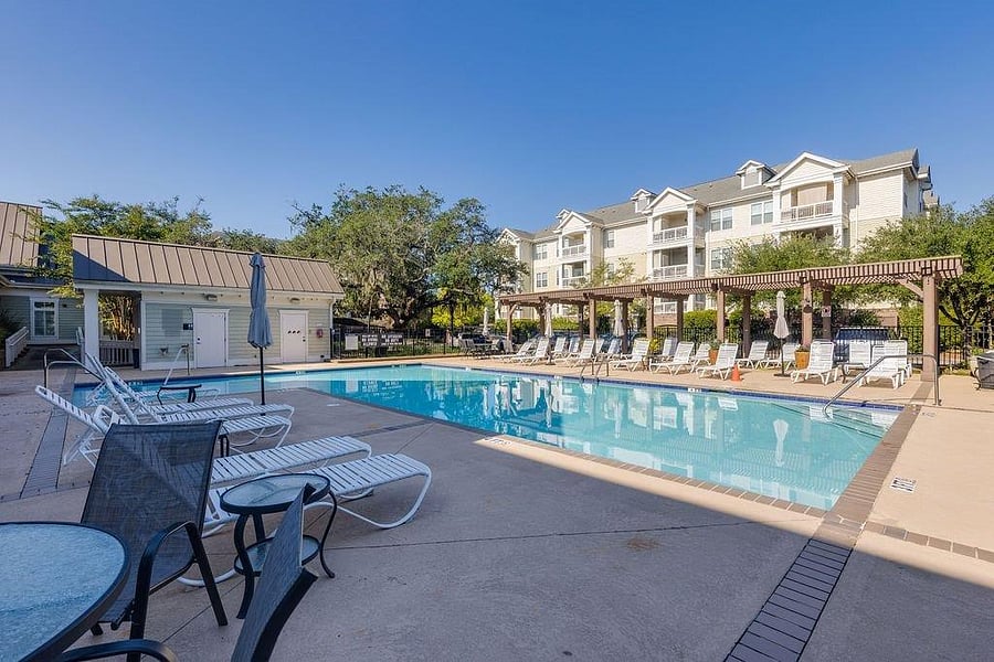 Seating and gas grills at the pool