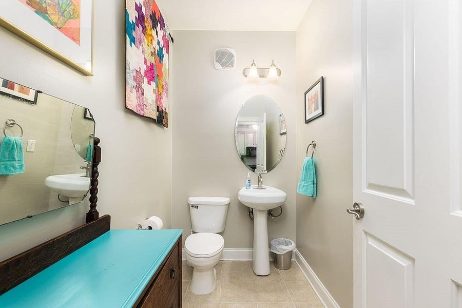 Half bath by the kitchen for guests