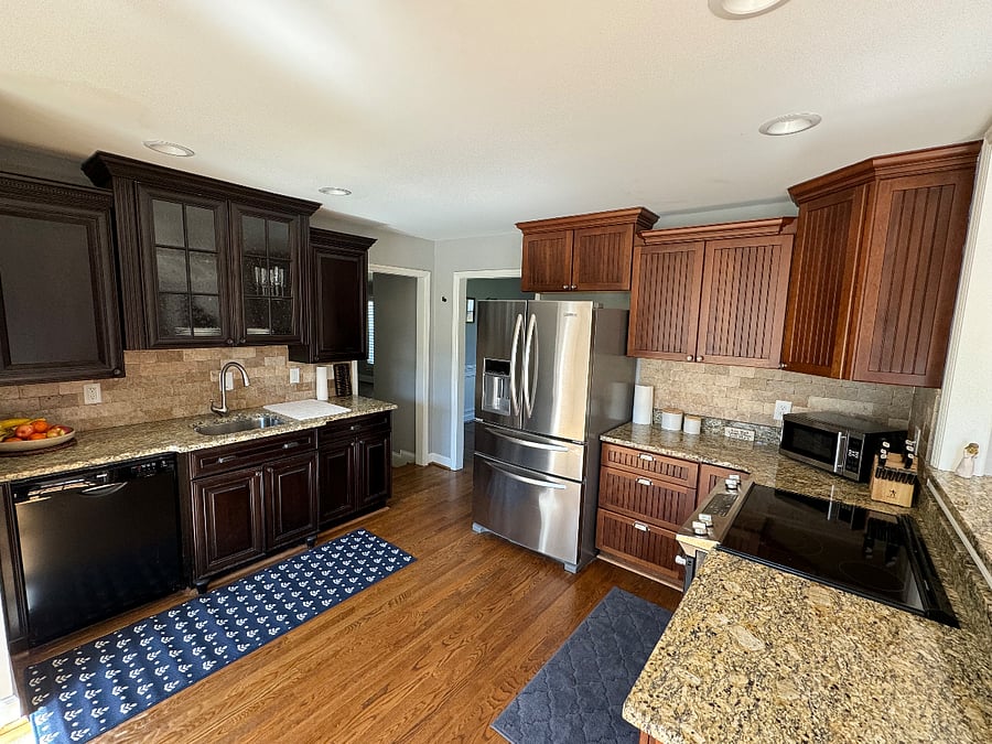 Kitchen. Opens to the right of image into the dining room