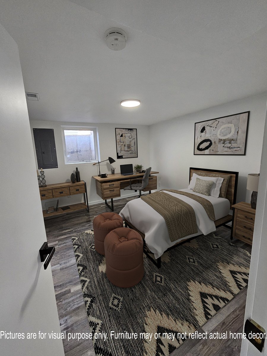 1 of the bedrooms (furniture is for staging purpose)