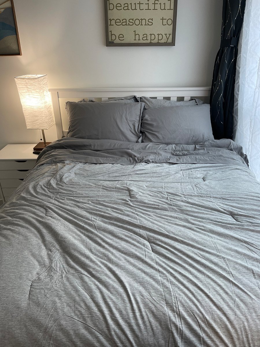 Queen size bed with bedding and pillows included