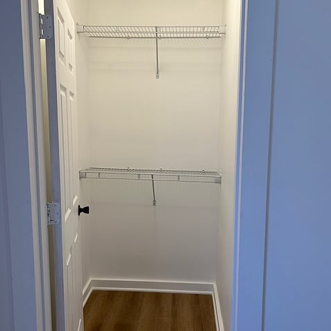 closet with extra shelving.
