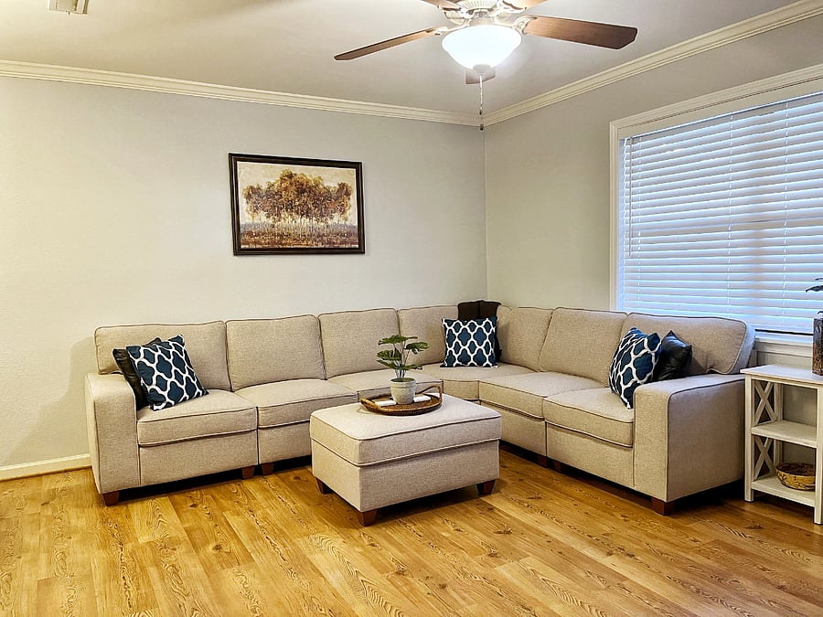 Living Room w/ Sectional Couch & 65" Smart TV