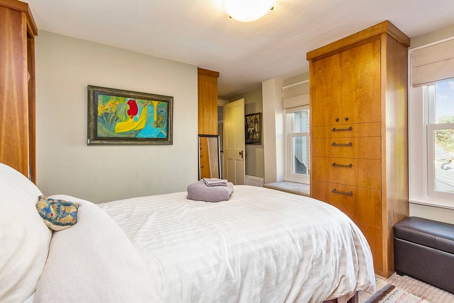 3rd bedroom with twin bed, and enough storage for all your shoes, and your friend's shoes