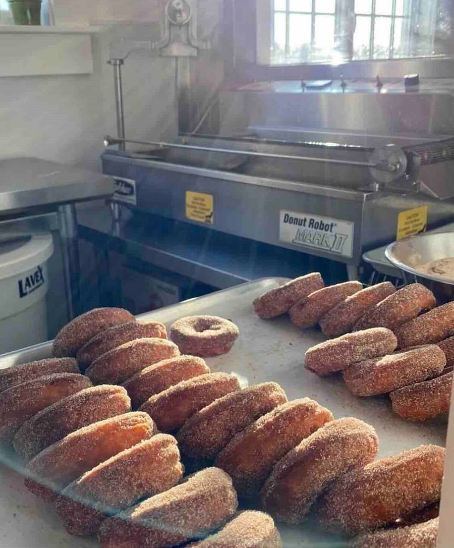 Warm apple cider donuts, made fresh daily! Stand also serves espresso, and has all the fixings for your meals, beer, wine, and more