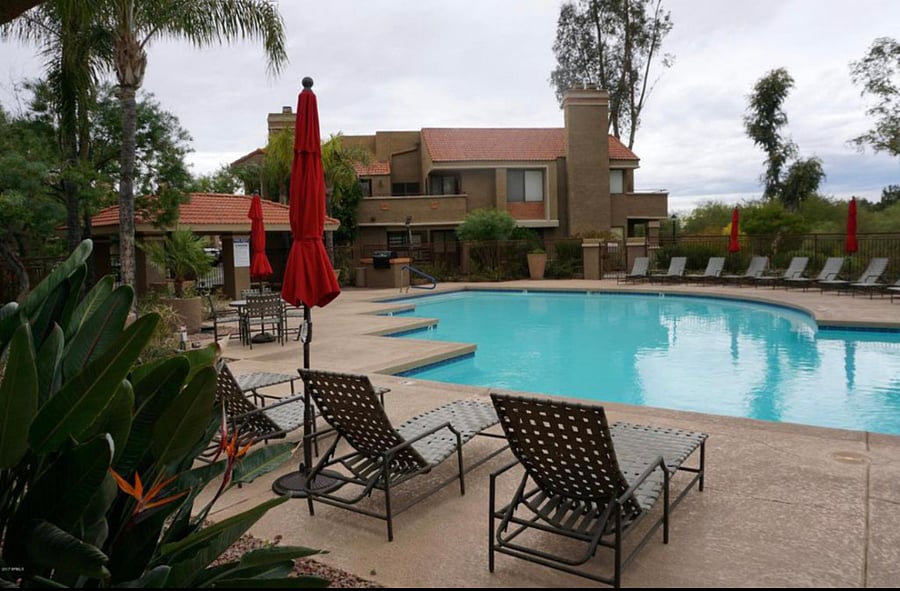 One of two community pools steps from the front door.