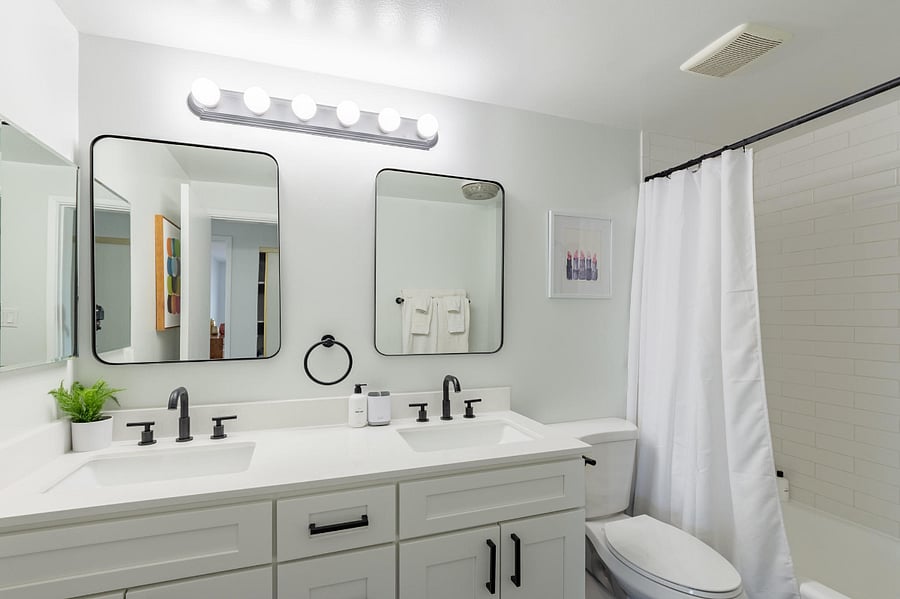 Gorgeous, remodeled bathroom with tub/shower combination. 