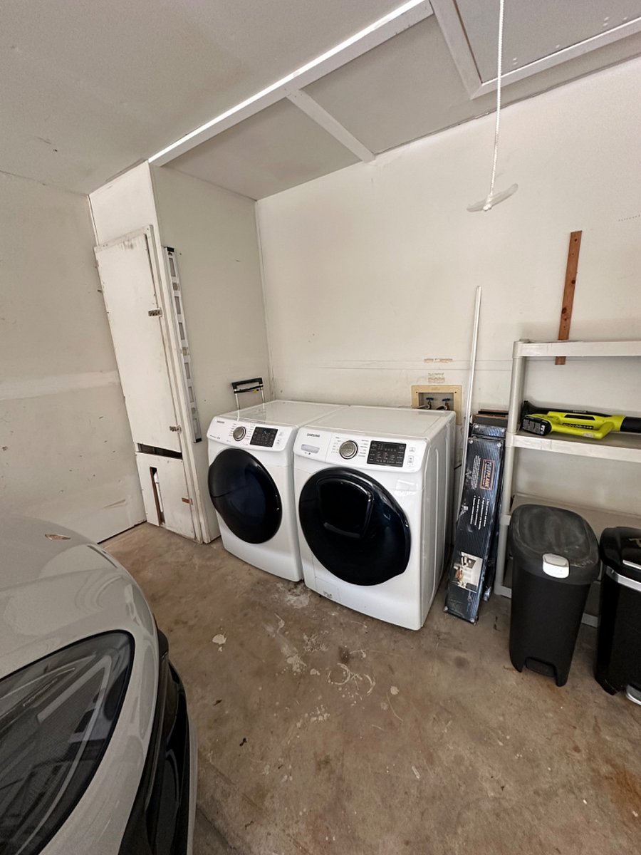 Washer and dryer are in the garage.