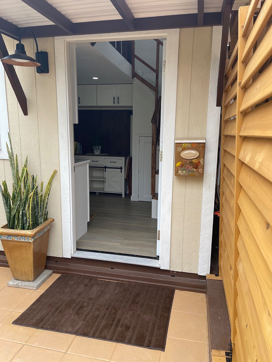 Entrance to tiny house, privacy Panels to the right