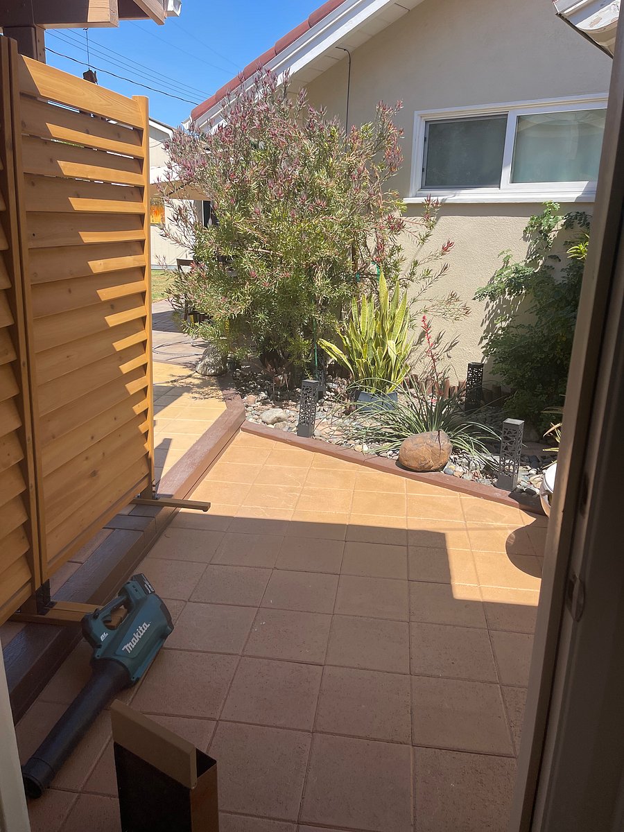 View from front door kitchen out in the courtyard