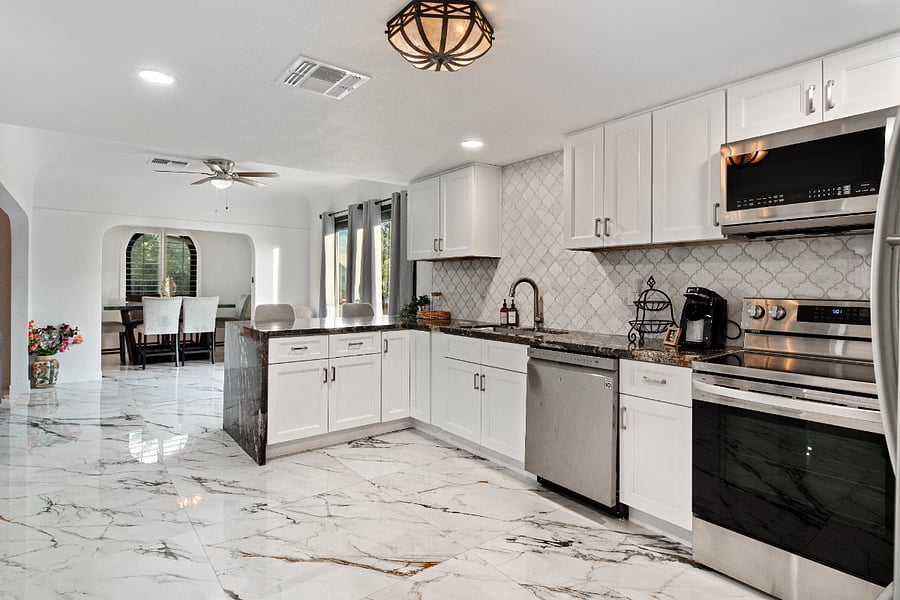 Kitchen: Granite counter tops stainless steel appliances