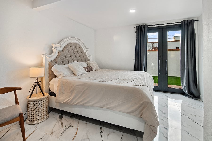 Master Bedroom with KING Bed and 1/2 bath and private enrance for privacy.