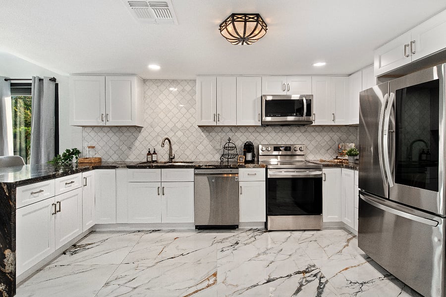 Kitchen: Granite counter tops stainless steel appliances