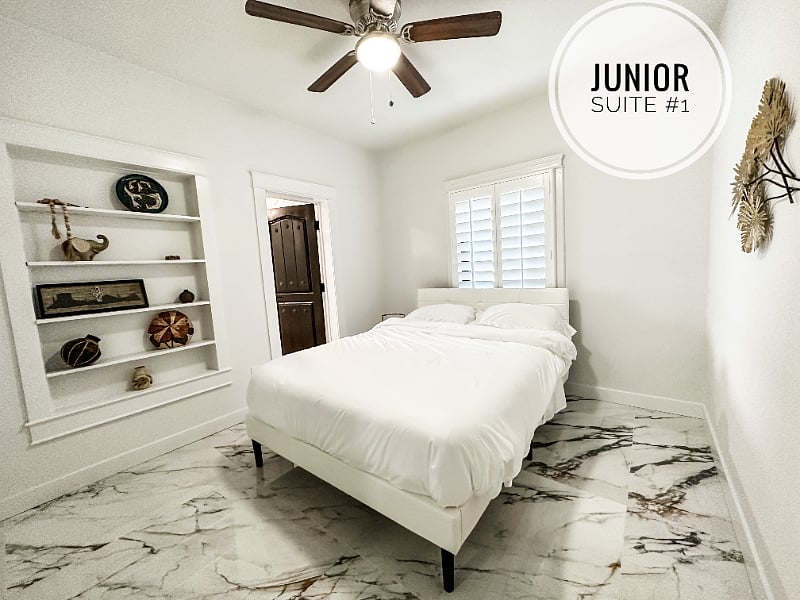 Bedroom with queen bed and attached full bath
